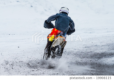 racer motorcycle race in winter 19908115