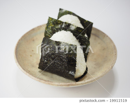 Two rice balls on a plate Two rice balls on a plate 19911519