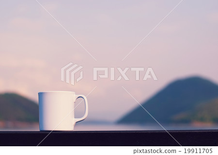 Coffee cup with river and mountain 19911705