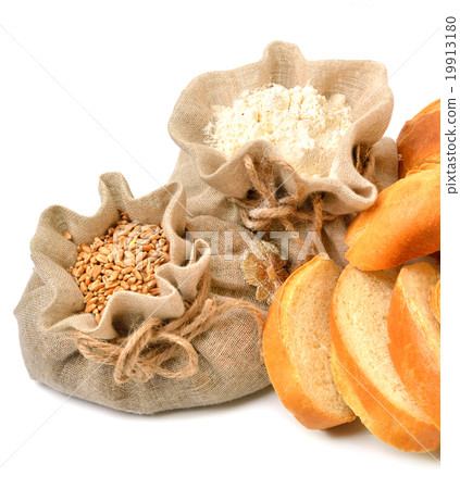 Wheat grains, flour, bread pieces in cloth sacks Wheat grains, flour, bread pieces in cloth sacks 19913180