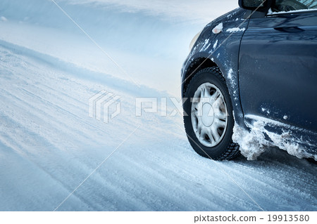 Closeup of car tires in winter  19913580