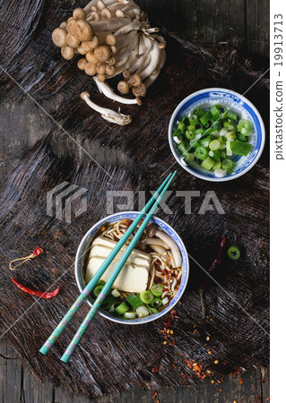 Asian soup ramen with feta cheese 19913713