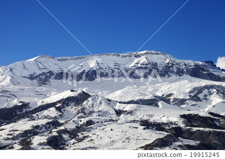Winter mountains at nice sun day 19915245