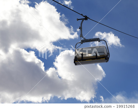 Chair-lift and sunlight sky 19915268