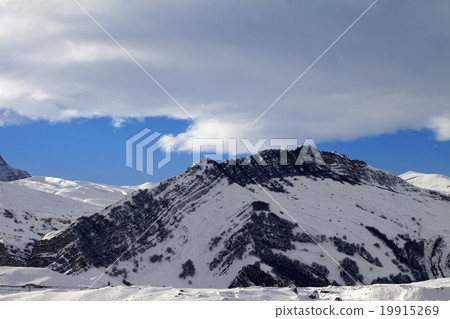 Winter mountains at nice sun evening 19915269