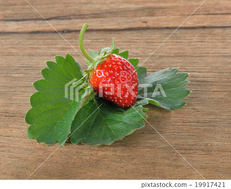 Strawberries on wood texture Strawberries on wood texture 19917421