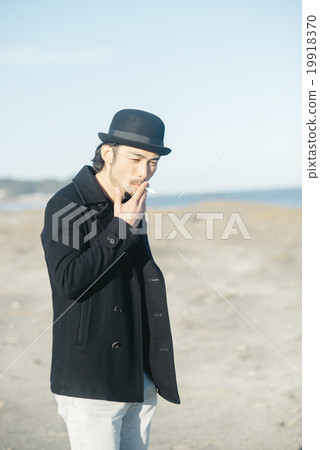 A man at the beach 19918370