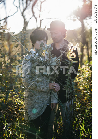 Men and women in the forest 19918378