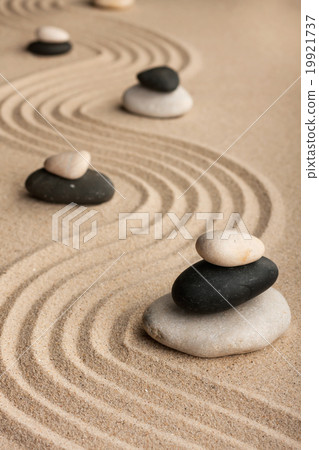 Pyramids made of stones standing on the sand Pyramids made of stones standing on the sand 19921737