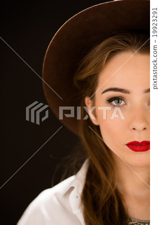 Close-up portrait of lady with red lips Close-up portrait of lady with red lips 19923291