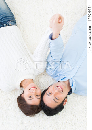 Young couple lifestyle lies down Young couple lifestyle lies down 19924654