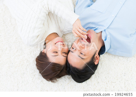 Young couple lifestyle lies down Young couple lifestyle lies down 19924655