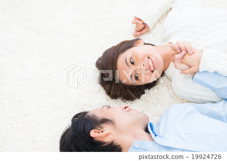 Young couple lifestyle lies down Young couple lifestyle lies down 19924726
