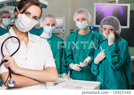 Surgery team after operation Surgery team after operation 19925540