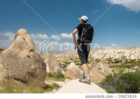 Lonely traveler looking to Cappadocia rocks 19925814