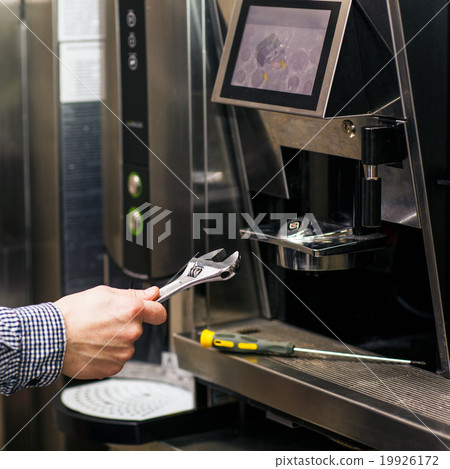 Man going to prerare coffee maker Man going to prerare coffee maker 19926172