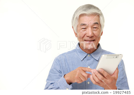 Elderly people using tablets 19927485