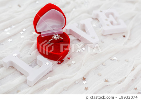 Word LOVE with engagement diamond ring Word LOVE with engagement diamond ring 19932074