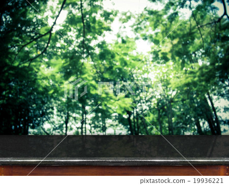 marble Table top at blurred group of trees marble Table top at blurred group of trees 19936221