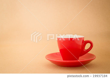 Beautiful red cup of coffee on vintage background Beautiful red cup of coffee on vintage background 19937184
