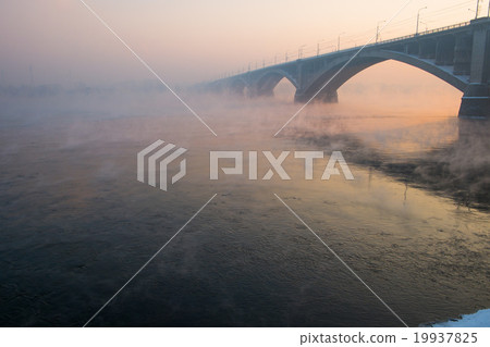 Winter river with vapors of the Municipal bridge Winter river with vapors of the Municipal bridge 19937825