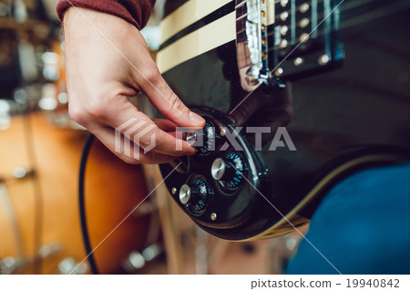 Man playing guitar 19940842