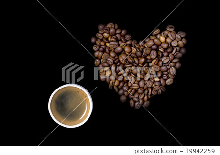 cup of coffee and the heart of the coffee beans cup of coffee and the heart of the coffee beans 19942259