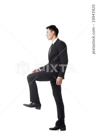 businessman walking up on stairs 19943920