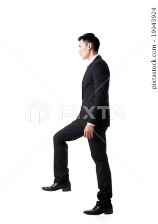 businessman walking up on stairs 19943924