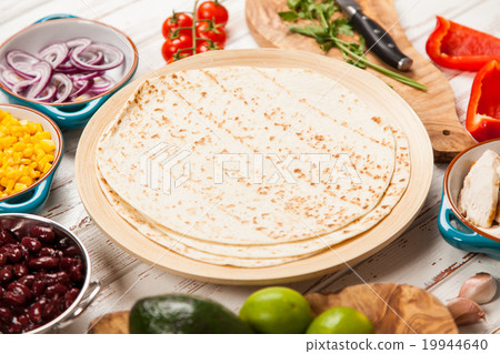 Tortilla with a mix of ingredients Tortilla with a mix of ingredients 19944640
