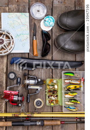 fishing tackles for journey on wooden boards fishing tackles for journey on wooden boards 19947596