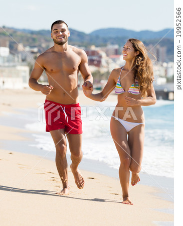 Positive couple running 19952566