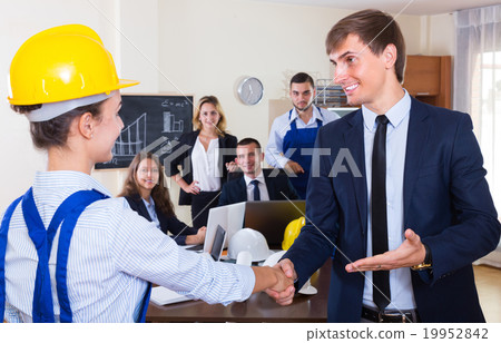 图库照片: handshaking of manager and employee.