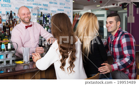 Friends drinking and chatting 19953489