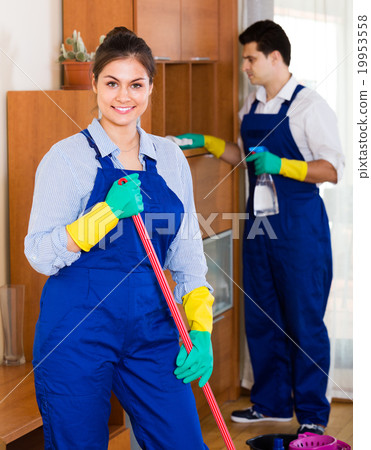 cleaners in overalls with supplies cleaners in overalls with supplies 19953558