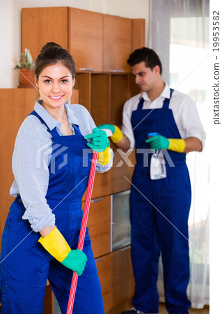Professional cleaners at the work. 19953582