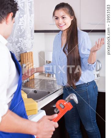 Housewife called professional plumber with tools to change bibc Housewife called professional plumber with tools to change bibc 19953583