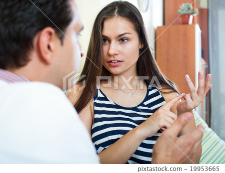 Angry spouses having domestic argue 19953665