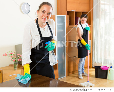 Female cleaners cleaning room . Female cleaners cleaning room . 19953987
