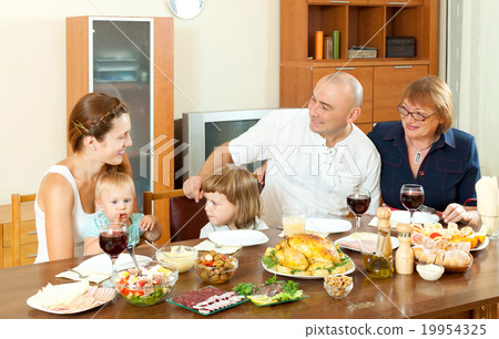 Happy multigeneration family having holiday dinner 19954325