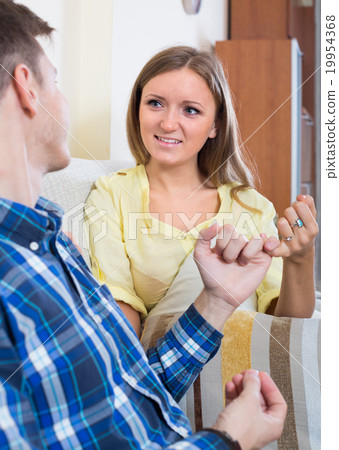 couple reconciling after quarrel 19954368