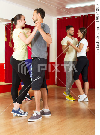couples dancing Latino dance 19954899