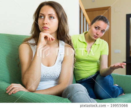 Two young women after quarrel at home. Two young women after quarrel at home. 19955066