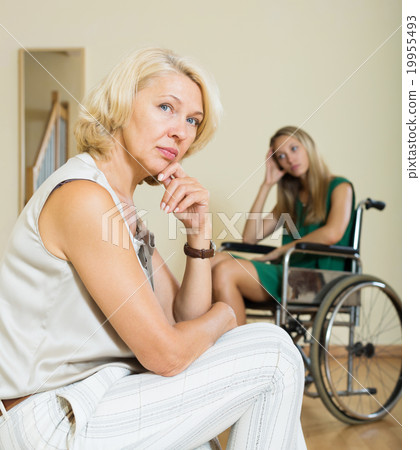 Upset woman and handicapped 19955493