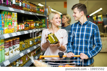 Clients buying tinned food 19955502