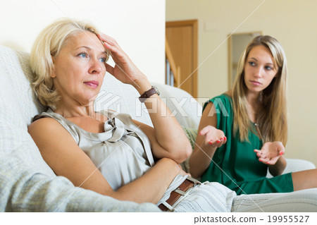 adult daughter and mature mother having conflict adult daughter and mature mother having conflict 19955527
