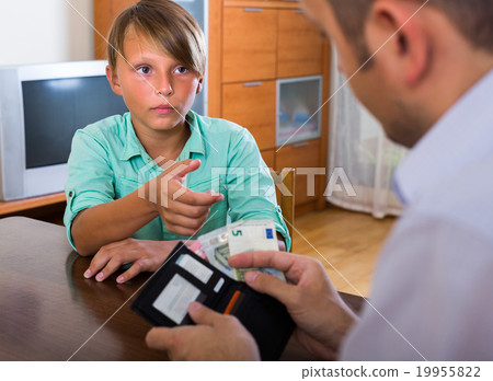 Boy asking father for money 19955822