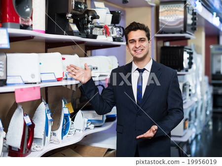 Male seller at household appliances section Male seller at household appliances section 19956019
