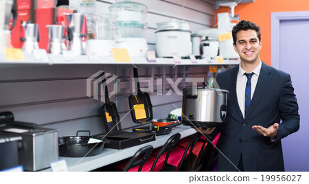 Seller at household appliances section 19956027