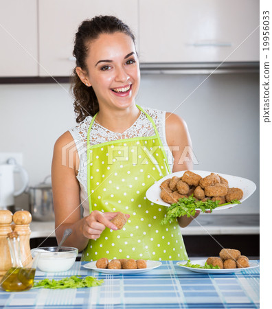 brunette with home-made croquettes brunette with home-made croquettes 19956033